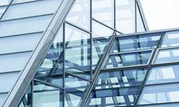 Symbolic image: Glass roof with many corners and individual panes of glass